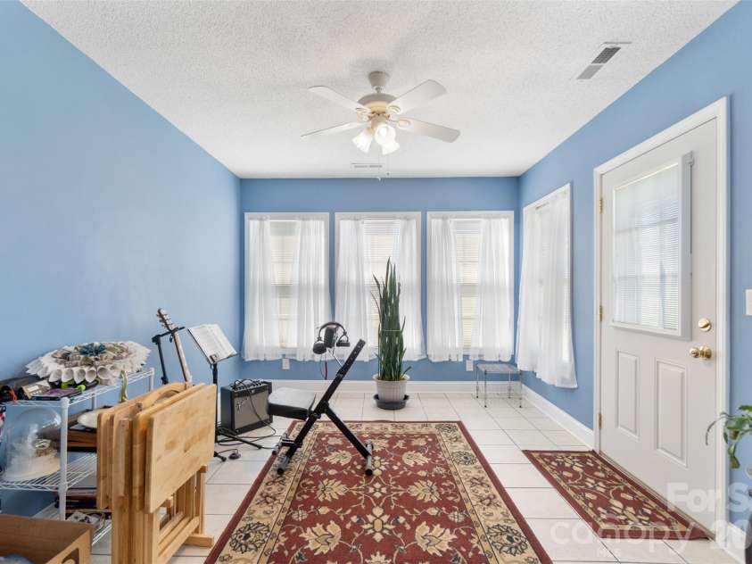 202 Big Dipper Court, Wingate, NC 28174.  MLS# CAR4382477, YatesRealty ID 23833. Sunroom