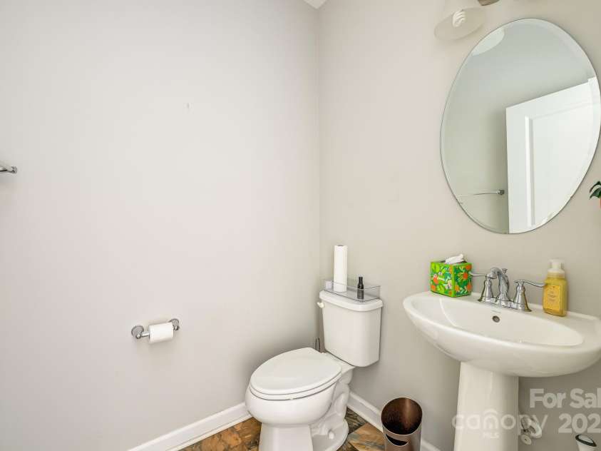 1295 Farm Branch Drive, Concord, NC 28027.  MLS# CAR4277916, YatesRealty ID 23835. Half bath down