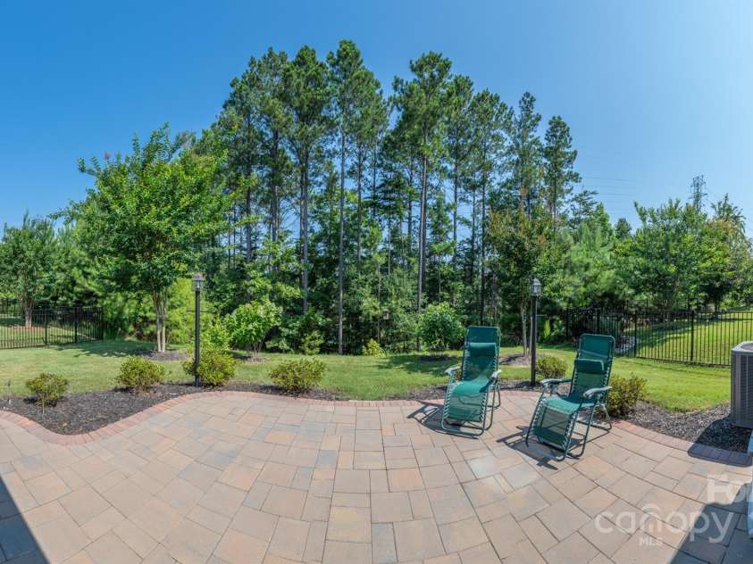 548 Cellini Place, Mount Holly, NC 28120.  MLS# CAR4275205, YatesRealty ID 23836. Back paver patio