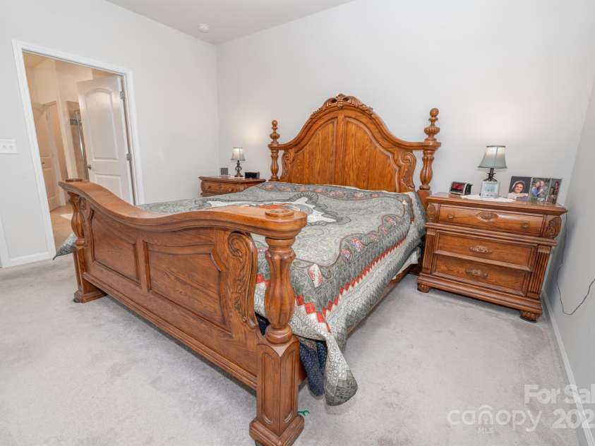 548 Cellini Place, Mount Holly, NC 28120.  MLS# CAR4275205, YatesRealty ID 23836. Primary bedroom