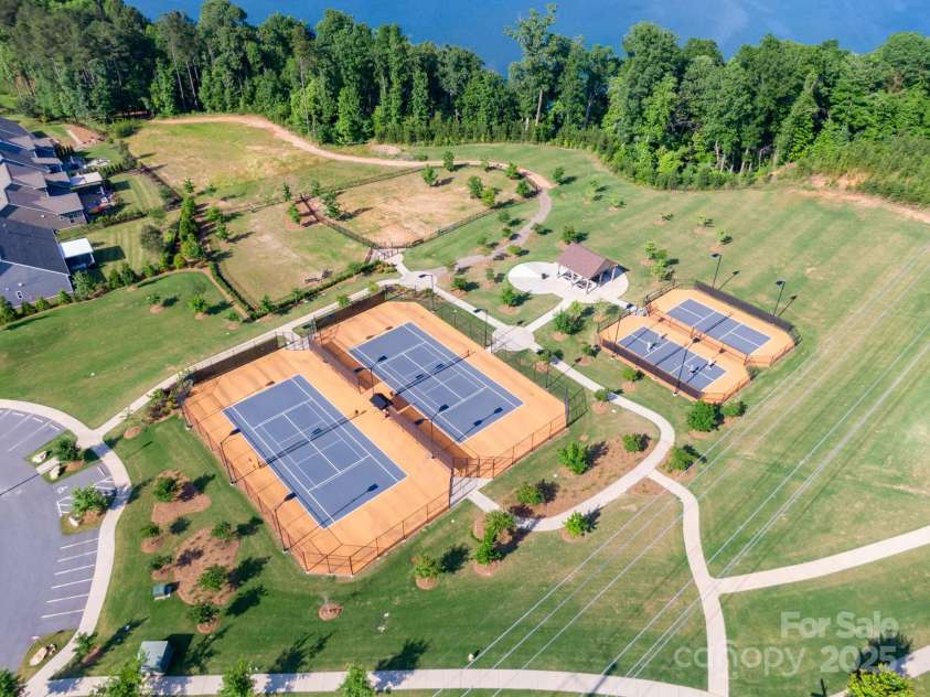 548 Cellini Place, Mount Holly, NC 28120.  MLS# CAR4275205, YatesRealty ID 23836. Tennis & pickleball courts and dog park