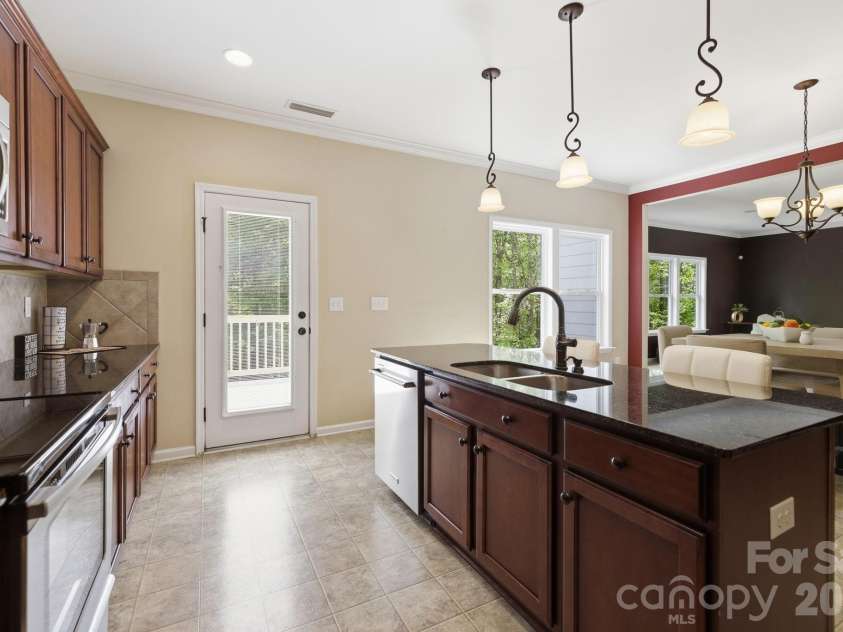 5404 Cotton Top Court, Waxhaw, NC 28173.  MLS# CAR4368521, YatesRealty ID 23840. Kitchen w/Elevated Deck