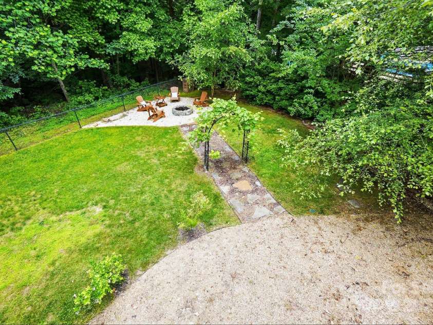 2745 Stockwood Drive, Gastonia, NC 28056.  MLS# CAR4253983, YatesRealty ID 23845. Fire pit activated