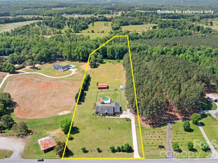 3987 NC 27 Highway, Lincolnton, NC 28092.  MLS# CAR4381735, YatesRealty ID 23846. The 7.5 ACRES goes into the Trees & There is also a Creek in the Back! (Borders for Reference Only)