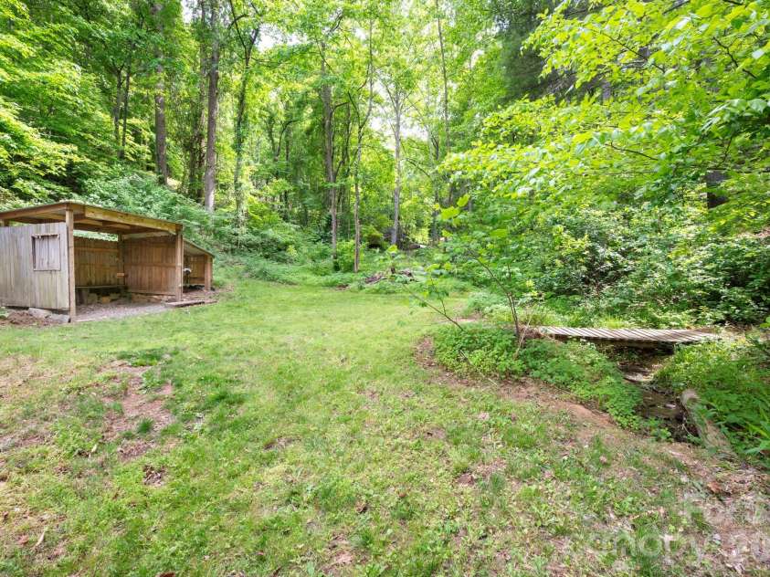 30 Lawterdale Circle, Asheville, NC 28804.  MLS# CAR4377707, YatesRealty ID 23849. Versatile lean-to-structure 