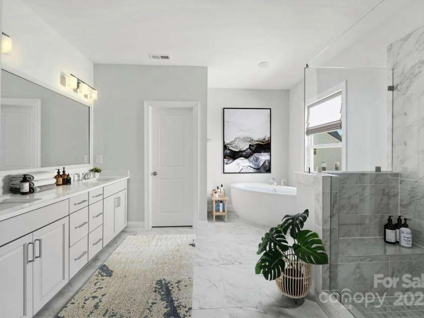 6022 Moonglade Lane, Charlotte, NC 28269.  MLS# CAR4315621, YatesRealty ID 2385. Photos are of a previously built Nayan Model home and are for illustrative purposes only. Design selections, finishes, and features may vary in the actual home.