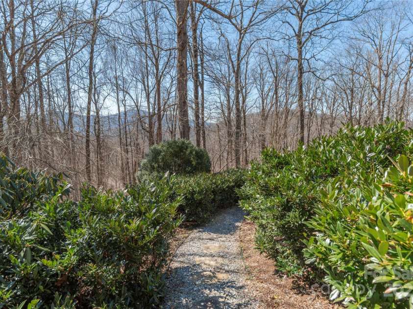 98 Flat Creek Road, Fairview, NC 28730.  MLS# CAR4185540, YatesRealty ID 2385. Native Landscaping