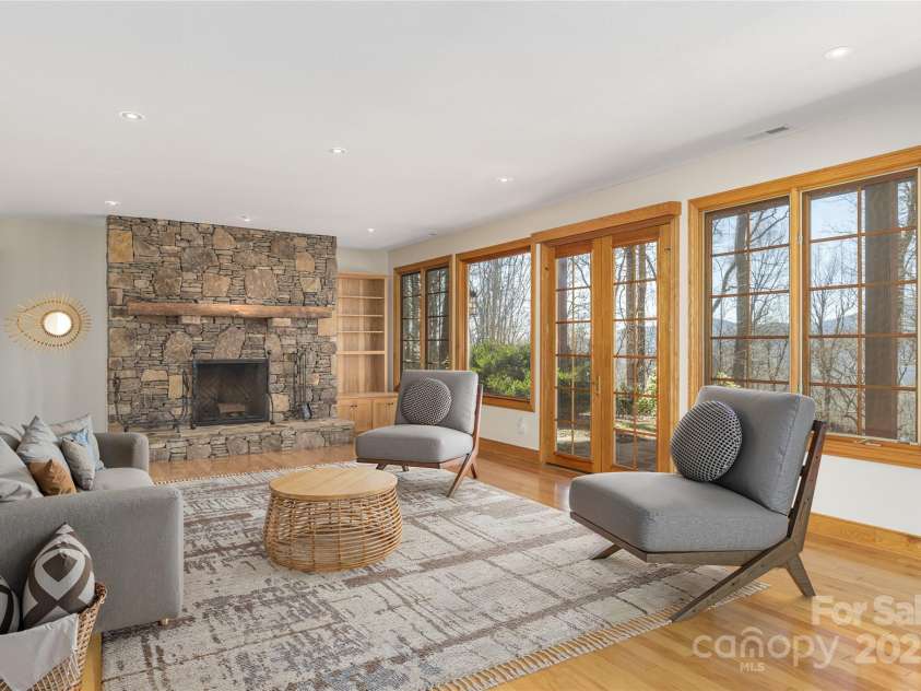 98 Flat Creek Road, Fairview, NC 28730.  MLS# CAR4185540, YatesRealty ID 2385. Virtually Furnished Family Room