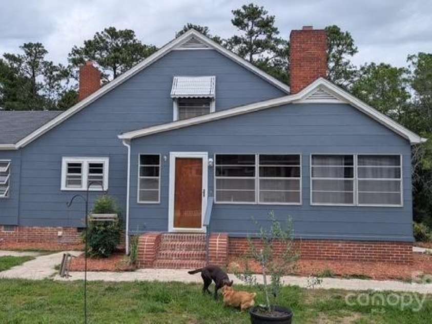 187 Cartledge Creek Road, Rockingham, NC 28379.  MLS# CAR4261307, YatesRealty ID 23852. Side view with sunporch