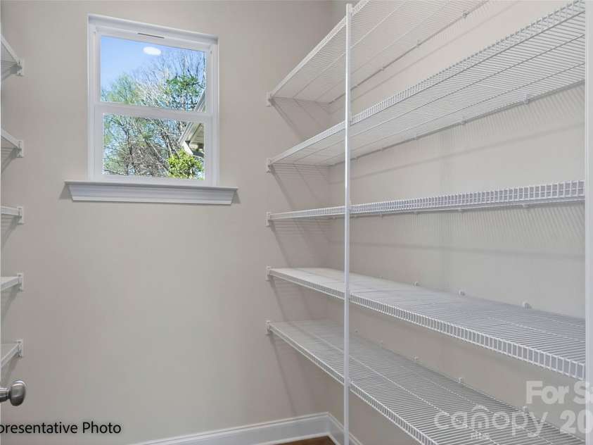 612 Central Drive, Statesville, NC 28677.  MLS# CAR4382134, YatesRealty ID 23852. Representative Photo. Pantry