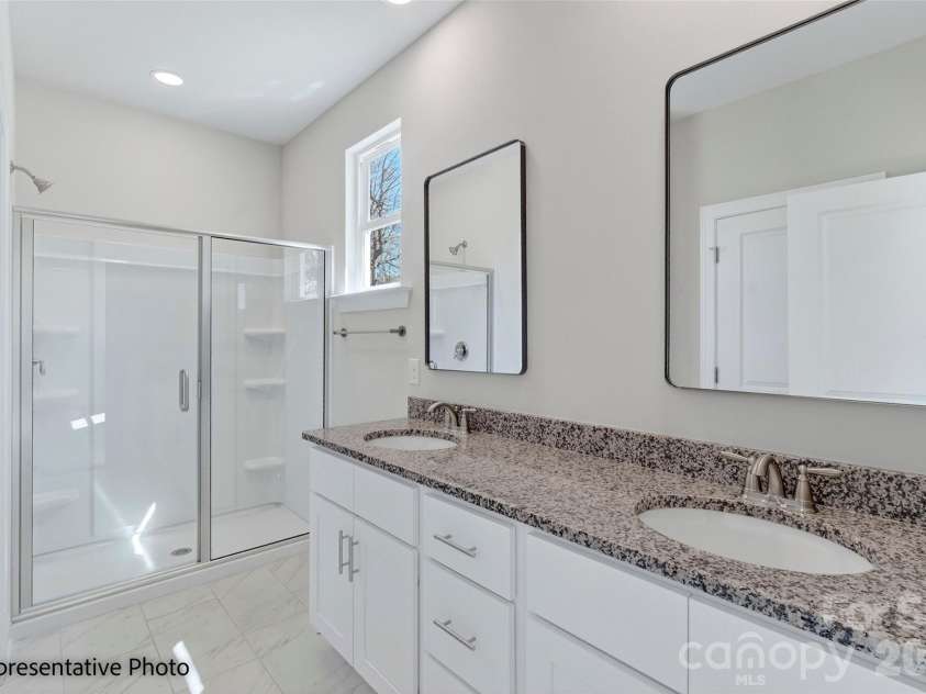 612 Central Drive, Statesville, NC 28677.  MLS# CAR4382134, YatesRealty ID 23852. Representative Photo. Primary Bathroom
