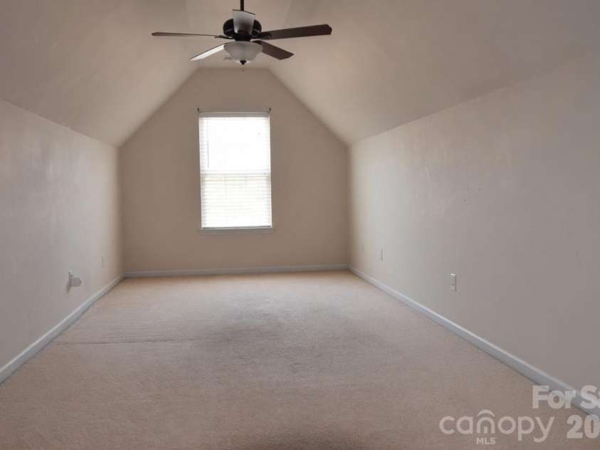 2007 Streamlet Way, Monroe, NC 28110.  MLS# CAR4376790, YatesRealty ID 23855. AI Staged Bedroom 4 / Bonus Room