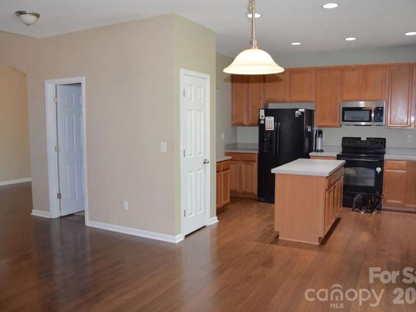 2007 Streamlet Way, Monroe, NC 28110.  MLS# CAR4376790, YatesRealty ID 23855. AI Staged Dining Nook