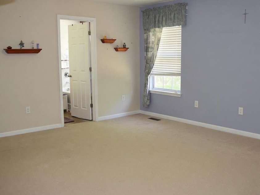 2007 Streamlet Way, Monroe, NC 28110.  MLS# CAR4376790, YatesRealty ID 23855. AI Staged Primary Bedroom