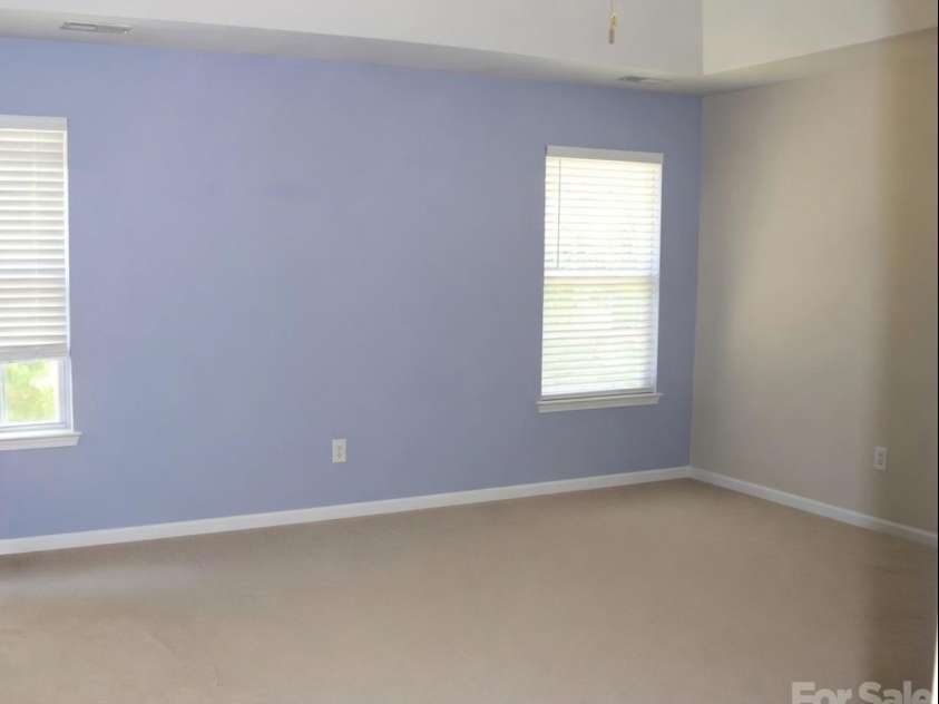 2007 Streamlet Way, Monroe, NC 28110.  MLS# CAR4376790, YatesRealty ID 23855. AI Staged Primary Bedroom