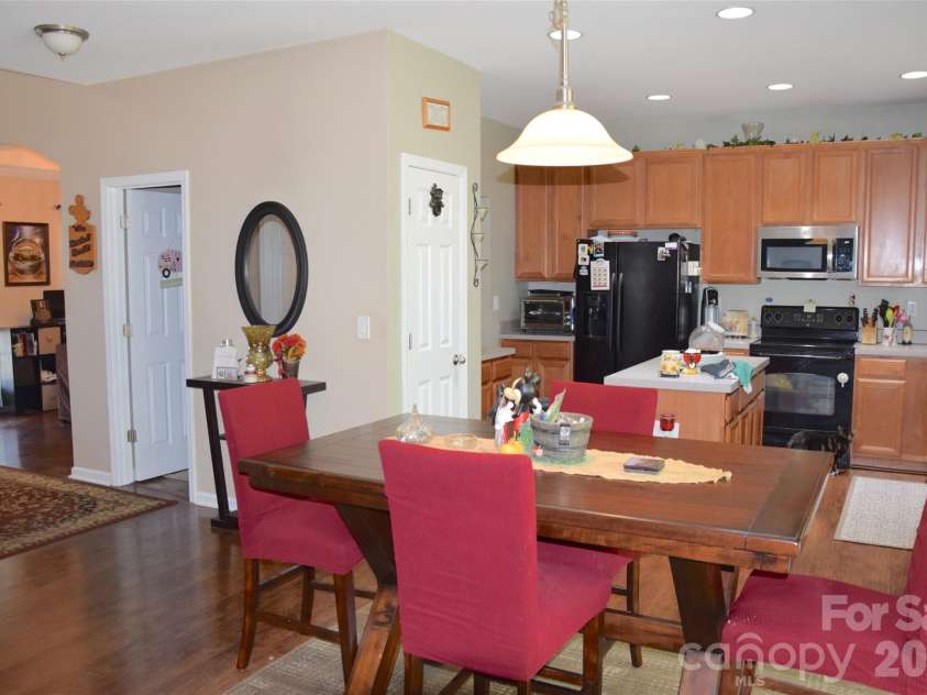 2007 Streamlet Way, Monroe, NC 28110.  MLS# CAR4376790, YatesRealty ID 23855. View from the living room into the kitchen.
