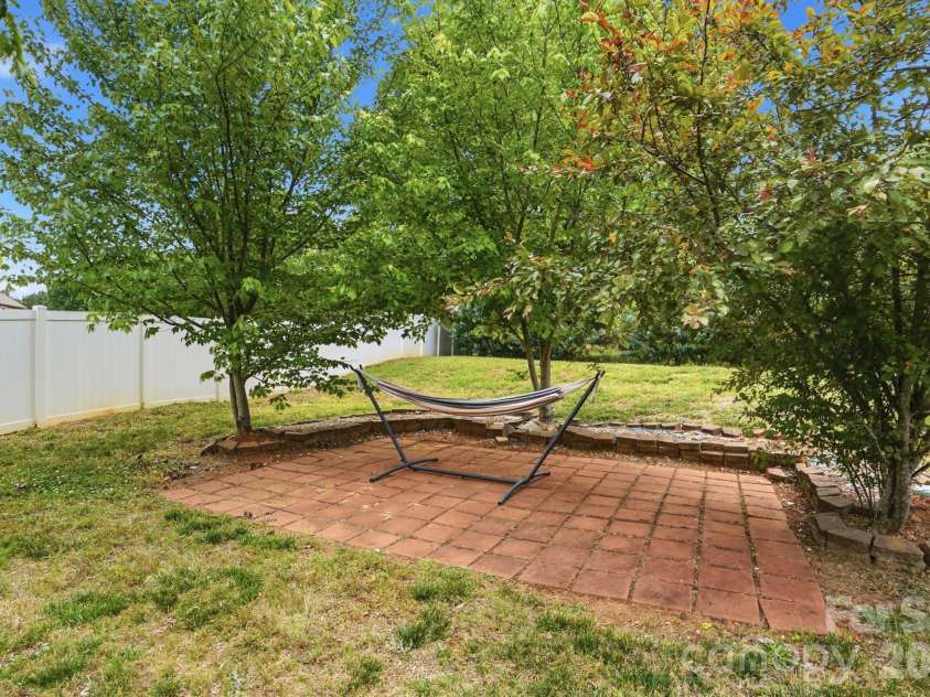 112 Meadow Stream Drive, Mount Holly, NC 28120.  MLS# CAR4378040, YatesRealty ID 23856. Backyard