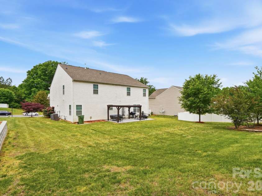 112 Meadow Stream Drive, Mount Holly, NC 28120.  MLS# CAR4378040, YatesRealty ID 23856. Backyard