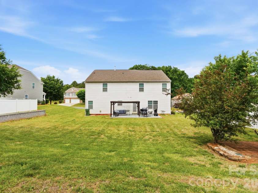 112 Meadow Stream Drive, Mount Holly, NC 28120.  MLS# CAR4378040, YatesRealty ID 23856. Backyard