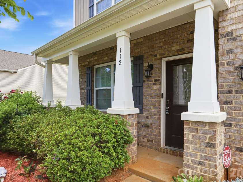 112 Meadow Stream Drive, Mount Holly, NC 28120.  MLS# CAR4378040, YatesRealty ID 23856. Front Porch
