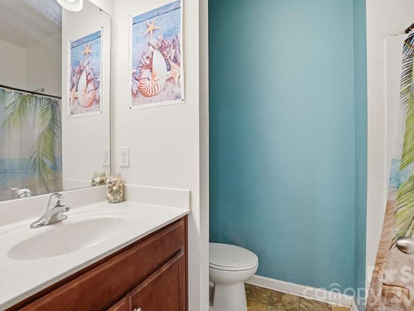 112 Meadow Stream Drive, Mount Holly, NC 28120.  MLS# CAR4378040, YatesRealty ID 23856. Full Bathroom off Bedroom Down