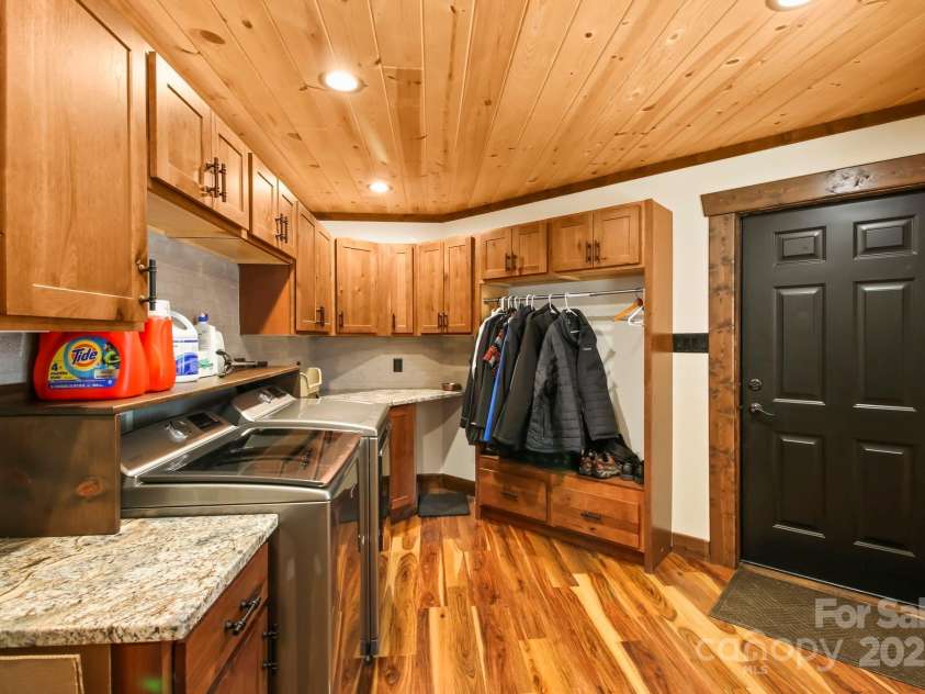 419 Antler Trail, Boone, NC 28607.  MLS# CAR4214579, YatesRealty ID 2386. Mudroom/laundry room off garage- laundry in luxury!