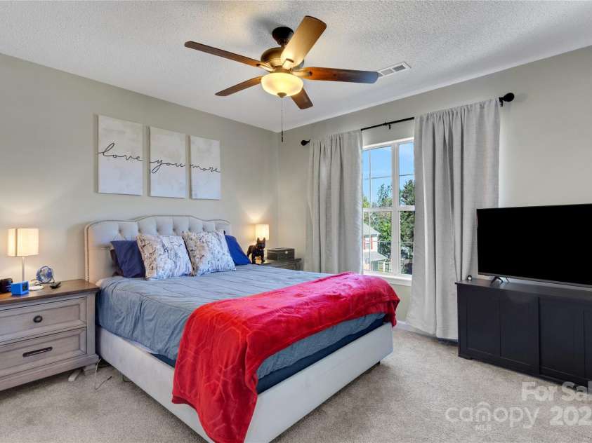 7 Diamond Hill Court, Greer, SC 29651.  MLS# CAR4317117, YatesRealty ID 2386. Primary bedroom with lots of warm natural light