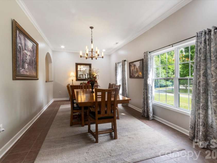 3860 Landrum Road, Columbus, NC 28722.  MLS# CAR4380844, YatesRealty ID 23865. Large dining room.  Note the 9 foot ceilings and crown molding!
