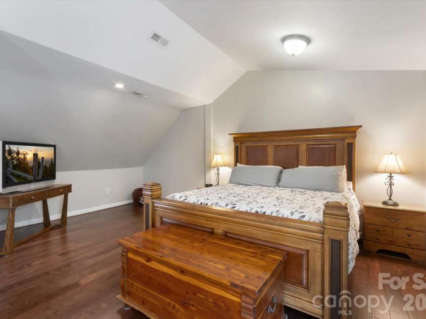 3860 Landrum Road, Columbus, NC 28722.  MLS# CAR4380844, YatesRealty ID 23865. Primary bedroom.  Birch floors.