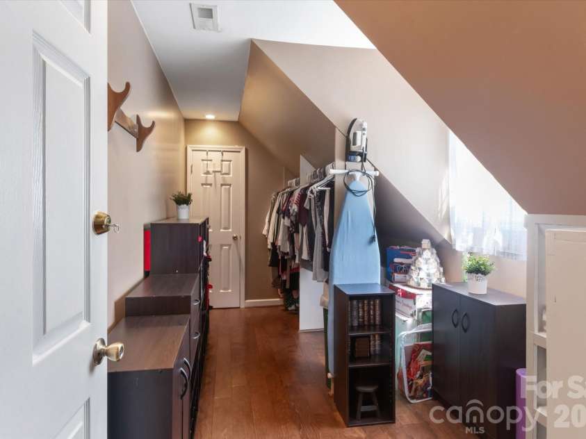 3860 Landrum Road, Columbus, NC 28722.  MLS# CAR4380844, YatesRealty ID 23865. Walk-in closet in primary bedroom.