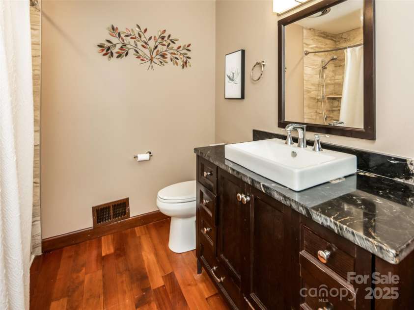 30 Falcon Wood Way, Flat Rock, NC 28739.  MLS# CAR4273281, YatesRealty ID 23873. Guest Bathroom