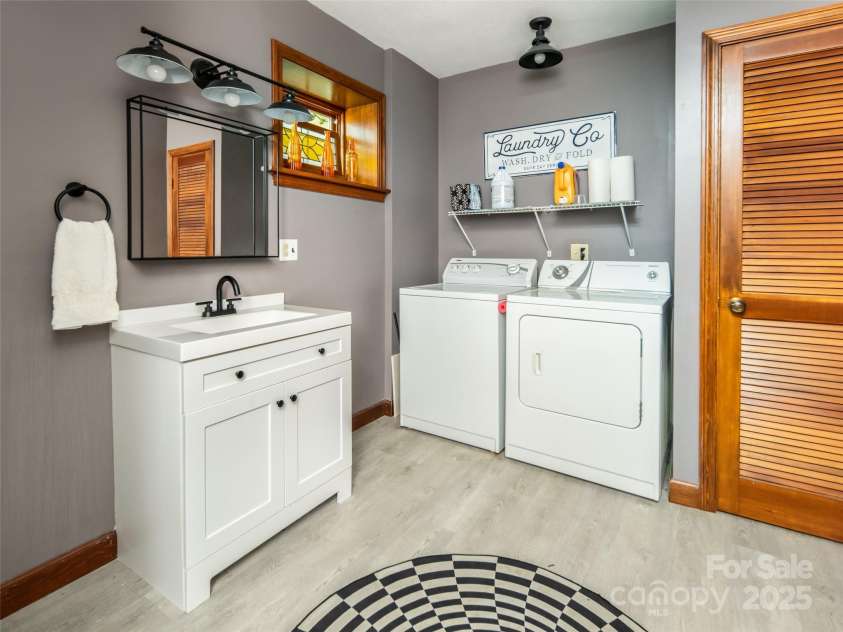 30 Falcon Wood Way, Flat Rock, NC 28739.  MLS# CAR4273281, YatesRealty ID 23873. Laundry In Lower Level