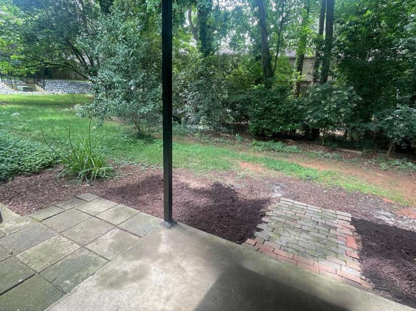 3200 Heathstead Place, Charlotte, NC 28210.  MLS# CAR4270773, YatesRealty ID 23880. Private covered patio, backs up to natural area