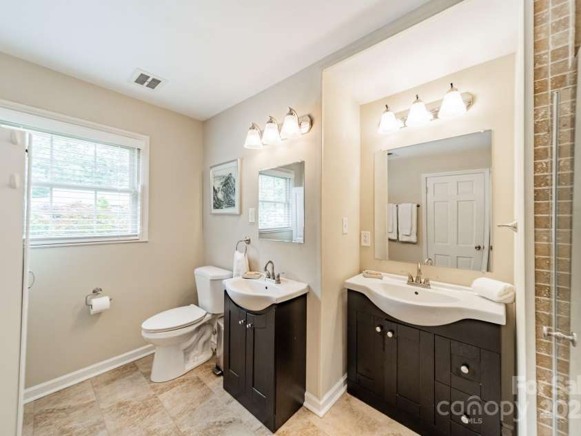 5522 Sharon Road, Charlotte, NC 28210.  MLS# CAR4251042, YatesRealty ID 23881. Double sinks in Primary Bath