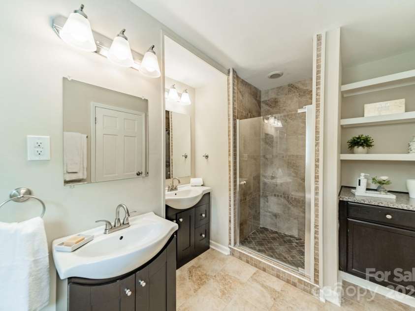 5522 Sharon Road, Charlotte, NC 28210.  MLS# CAR4251042, YatesRealty ID 23881. Vanity station with shelving & cabinetry