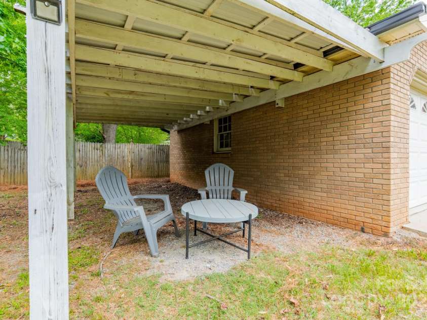 5522 Sharon Road, Charlotte, NC 28210.  MLS# CAR4251042, YatesRealty ID 23881. Wooden pergola attached to Garage