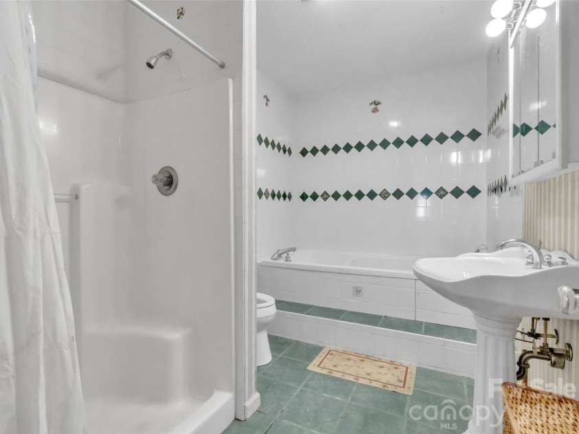 39 Millard Cove Road, Leicester, NC 28748.  MLS# CAR4355242, YatesRealty ID 23882. Downstair bath