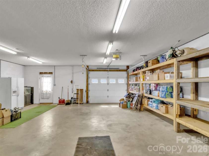 39 Millard Cove Road, Leicester, NC 28748.  MLS# CAR4355242, YatesRealty ID 23882. Large Garage