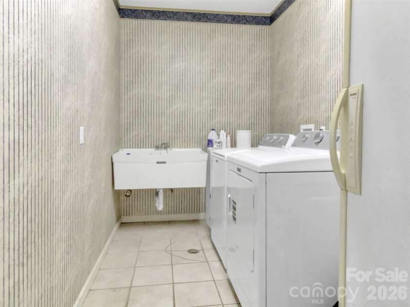 39 Millard Cove Road, Leicester, NC 28748.  MLS# CAR4355242, YatesRealty ID 23882. Laundry Room