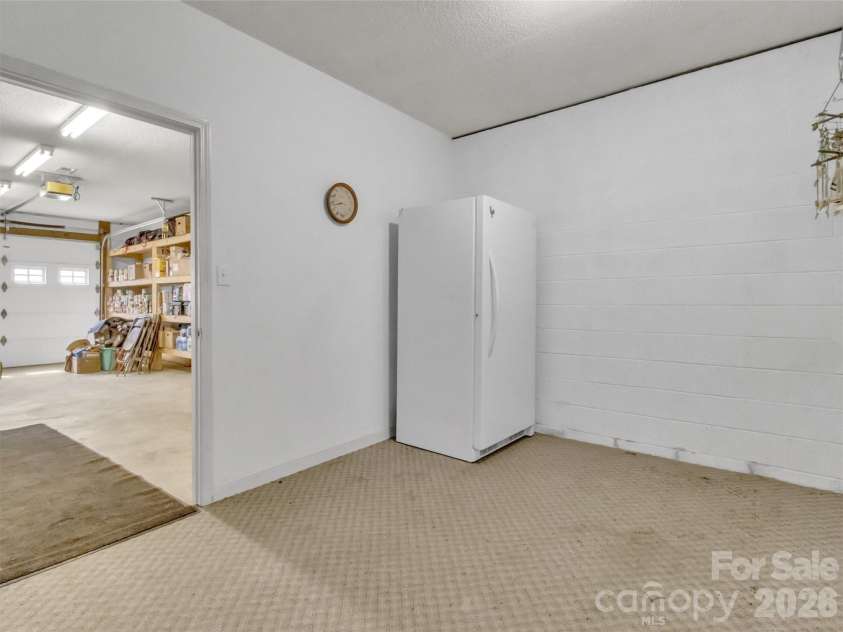39 Millard Cove Road, Leicester, NC 28748.  MLS# CAR4355242, YatesRealty ID 23882. More heated space in basement