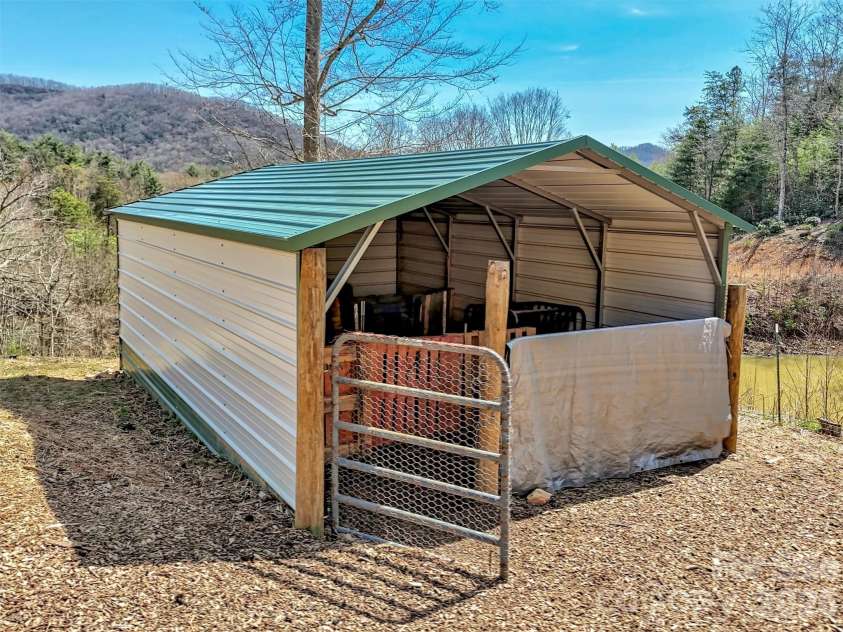 39 Millard Cove Road, Leicester, NC 28748.  MLS# CAR4355242, YatesRealty ID 23882. Shelter for sheep/animals