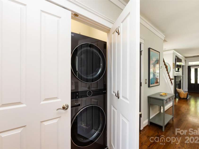 298 Bridges Farm Road, Mooresville, NC 28115.  MLS# CAR4273667, YatesRealty ID 23885. Laundry closet on the main level with stacked washer and dryer