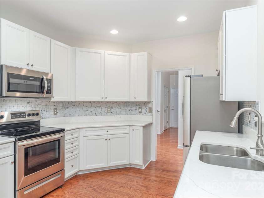 309 Wild Ginger Court, Weaverville, NC 28787.  MLS# CAR4277485, YatesRealty ID 23886. Quartz Countertops, Tile Back Splash
