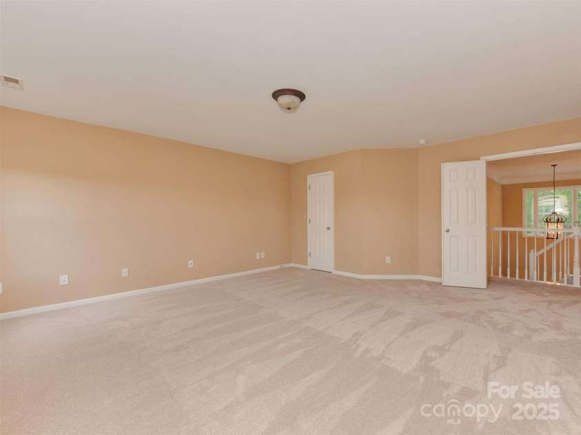 5607 Fulton Ridge Drive, Indian Trail, NC 28079.  MLS# CAR4259354, YatesRealty ID 23888. Bonus room, looking at its entrance (double doors)