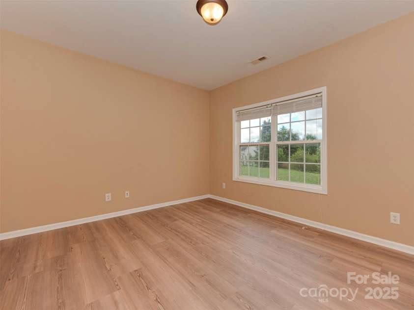 5607 Fulton Ridge Drive, Indian Trail, NC 28079.  MLS# CAR4259354, YatesRealty ID 23888. If you go left after  the guest bathroom, you will see the main office. This room can serve other purposes too... What do you think you can use it for ? hmmm !!!