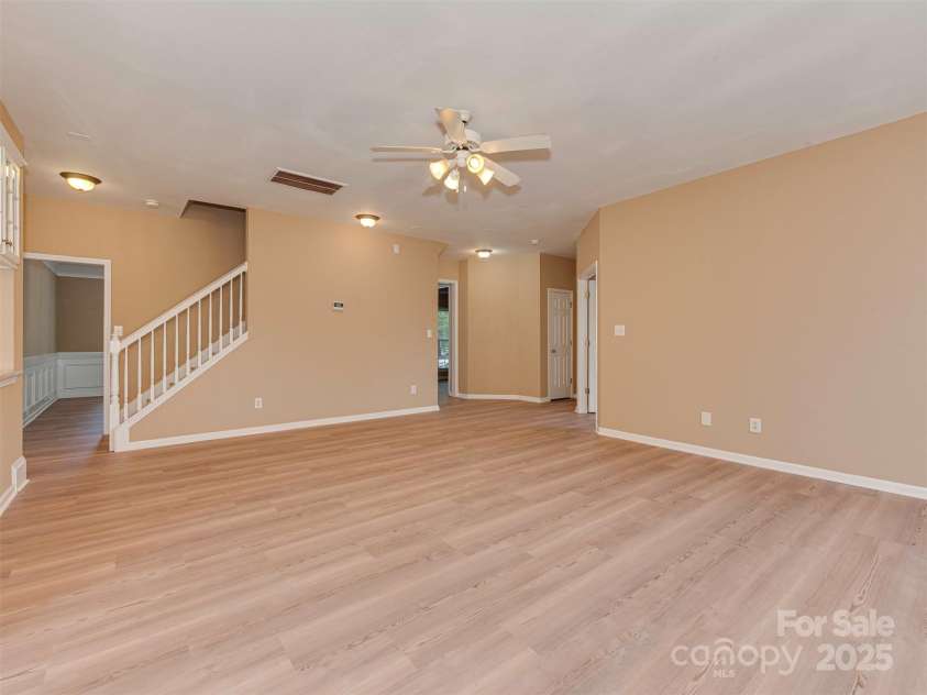 5607 Fulton Ridge Drive, Indian Trail, NC 28079.  MLS# CAR4259354, YatesRealty ID 23888. Looking from the family room towards the entrance.