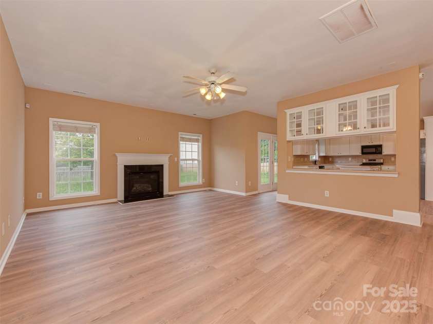 5607 Fulton Ridge Drive, Indian Trail, NC 28079.  MLS# CAR4259354, YatesRealty ID 23888. Most likely you would go straight instead of the office to enjoy the family room !
