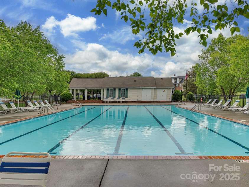 5607 Fulton Ridge Drive, Indian Trail, NC 28079.  MLS# CAR4259354, YatesRealty ID 23888. The Community Poolis also within walking distance of the house.