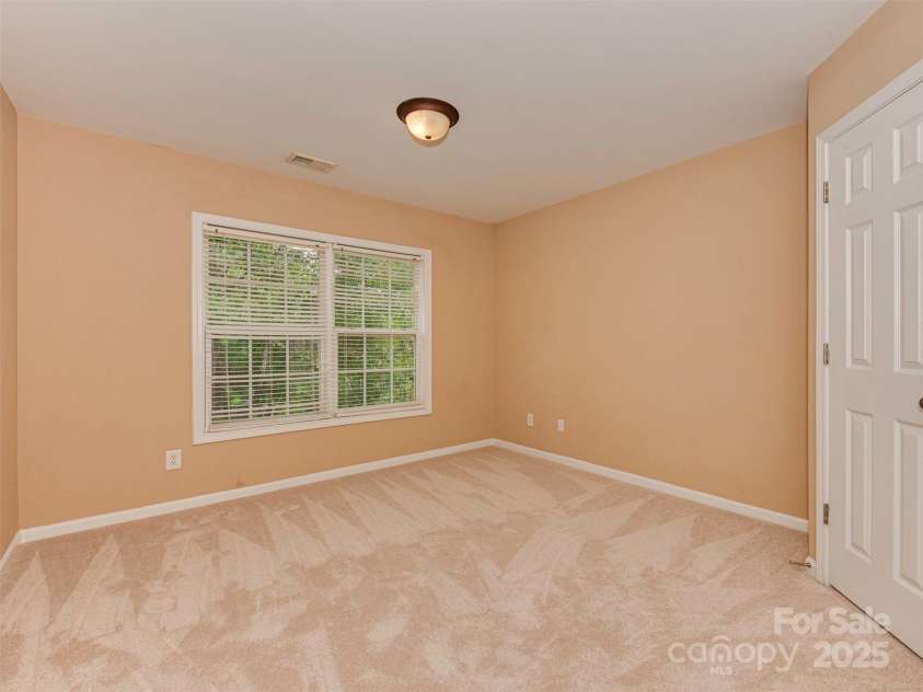 5607 Fulton Ridge Drive, Indian Trail, NC 28079.  MLS# CAR4259354, YatesRealty ID 23888. Upstairs, bedroom 1, on the left front of the house.