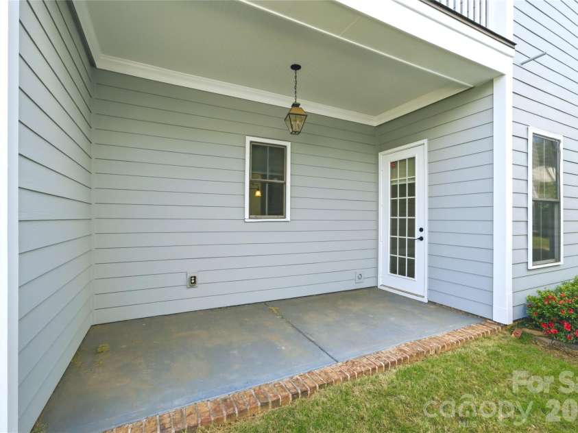 10227 Sam Meeks Road, Pineville, NC 28134.  MLS# CAR4381967, YatesRealty ID 23891. Covered Side Porch